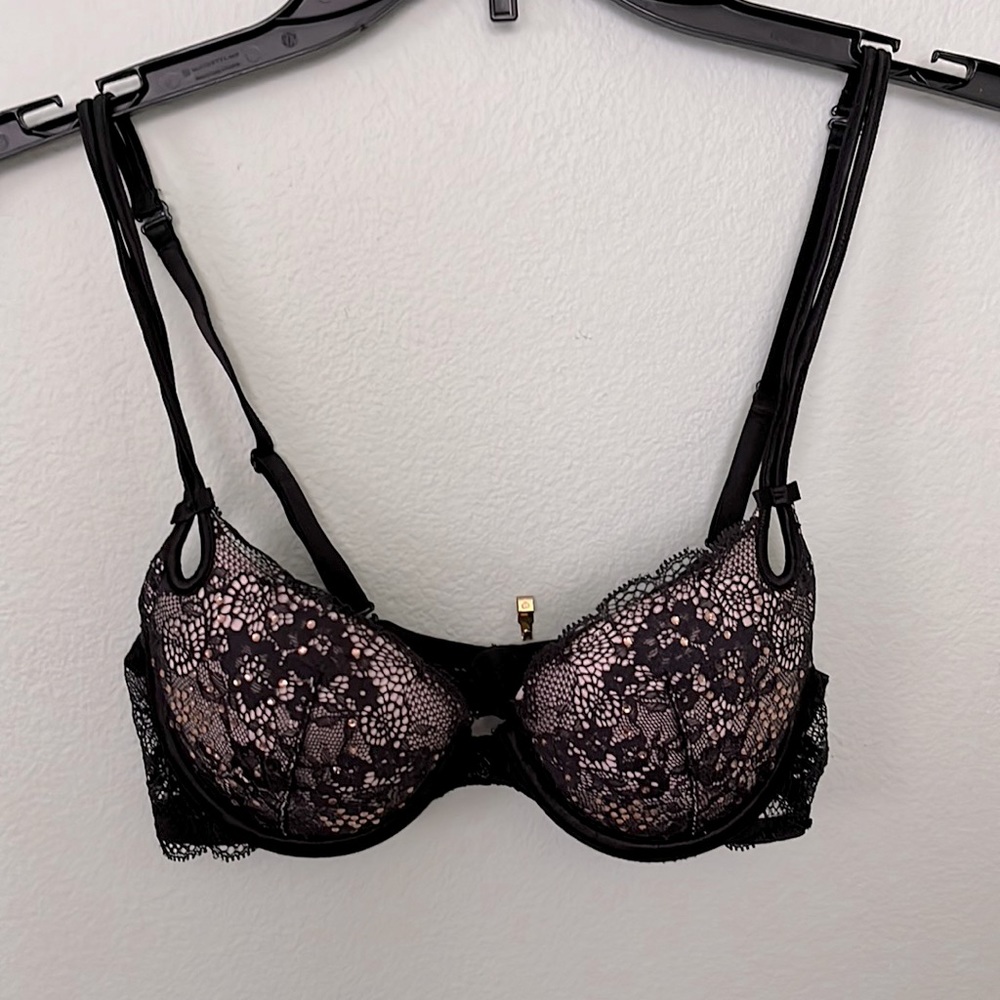 Victoria Secret black lace bra with rhinestone embellishment.